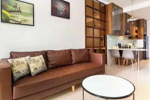 Grand Suite, 1 Bedroom, Club lounge access, City View | Egyptian cotton sheets, premium bedding, down duvets - Odela Luxstay Golden Mansion Residence (Phu Nhuan)