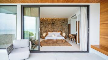 Premium bedding, down duvets, free minibar items, in-room safe