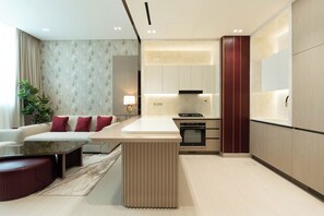 Deluxe Apartment, Balcony, City View | Private kitchen | Fridge, oven, stovetop, coffee/tea maker - Binghatti Royale - Luxury 1BR Haven (Dubai)