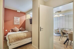 1 bedroom, desk, iron/ironing board, bed sheets