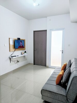 Family Apartment | Living area - Apartemen The Archies by Linkara (Jakarta)