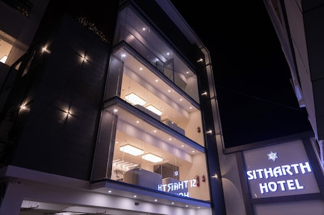 Front of property – evening/night. Sitharth Hotel