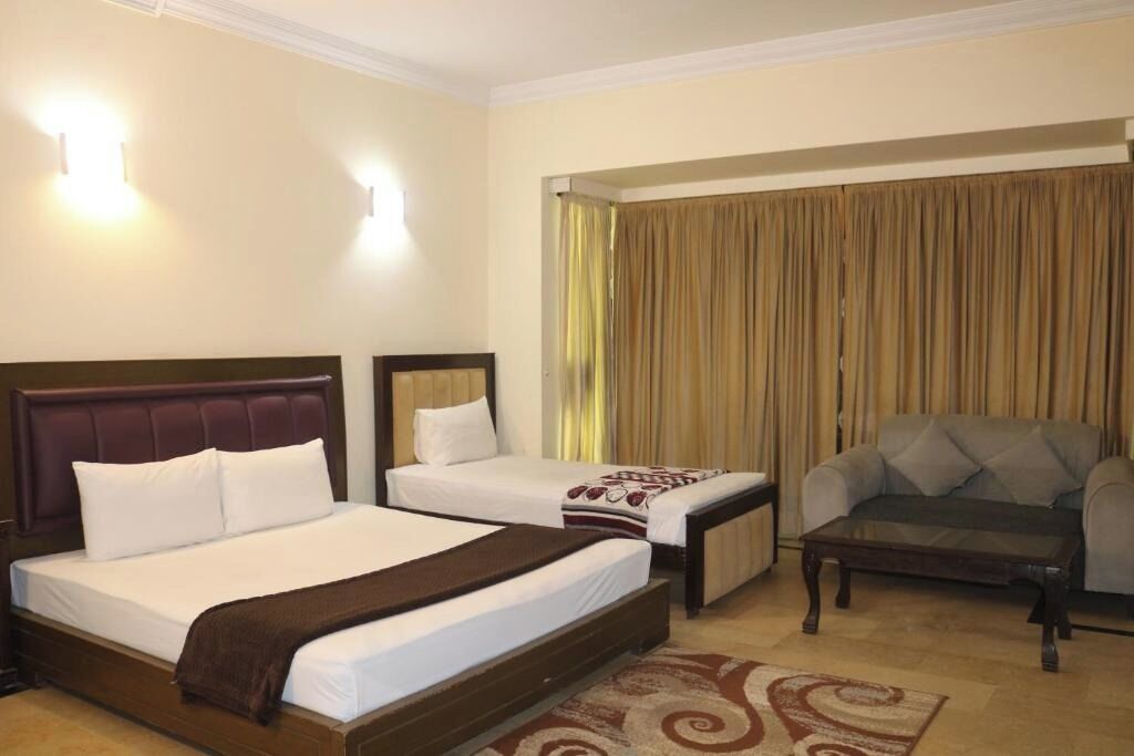 Deluxe Triple Room, City View