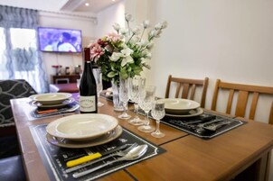 Classic Apartment, 3 Bedrooms, Courtyard View | Living area | 5-inch TV with satellite channels