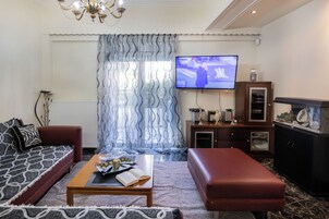 Classic Apartment, 3 Bedrooms, Courtyard View | Living area | 5-inch TV with satellite channels