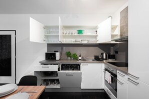 Apartamento Confort, vistas a la ciudad | Cocina privada