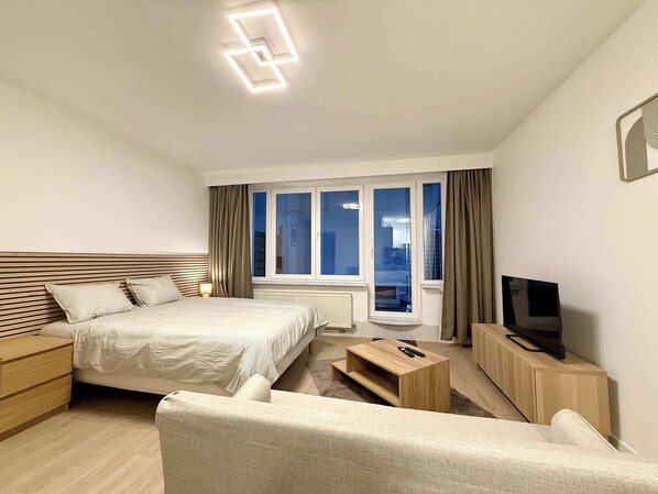 1 habitación, tabla de planchar con plancha, wifi y ropa de cama 