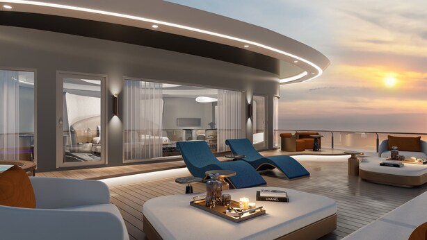 A luxurious outdoor deck with seating areas, a bar, and a view of the sunset. - Athena Premium Cruise Halong Bay (Bai Chay)