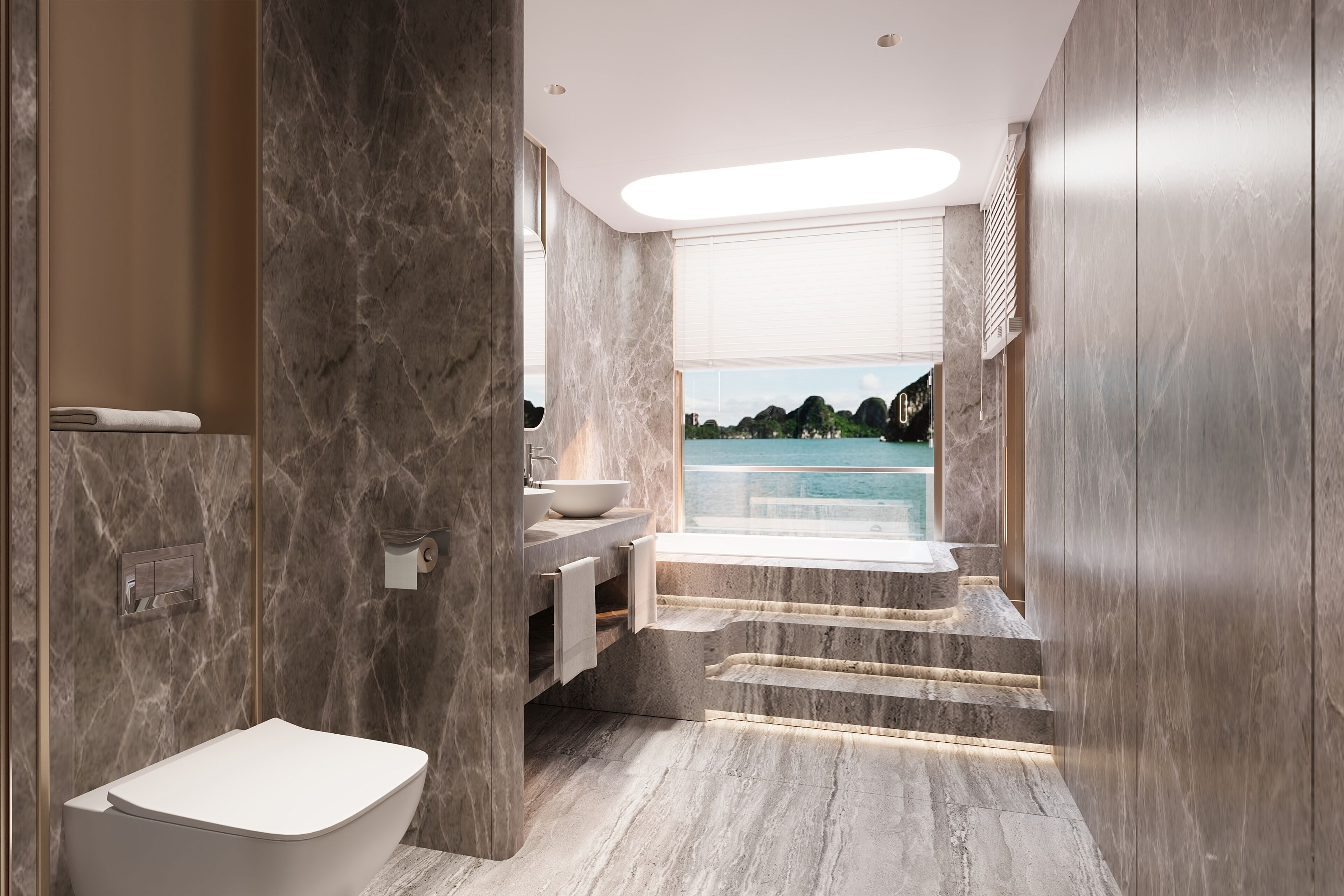 Un baño moderno con bañera, lavabo e inodoro. Se ve un ventanal con vistas al agua y follaje.