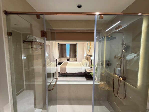 Deluxe Room | Bathroom | Free toiletries, hair dryer, bathrobes, slippers - De Lush Pune (Paud)