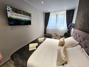 2 bedrooms, desk, iron/ironing board, travel crib