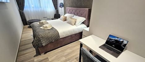 Desk, iron/ironing board, travel cot, free WiFi