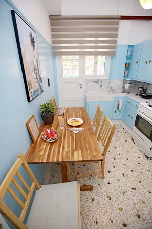 Dining - Retro Athens - 2BR Apartment with Piano, Bright Lounge & Fast Fiber Internet! (Vironas)