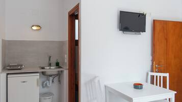 Coffres-forts dans les chambres, fer et planche Ă repasser