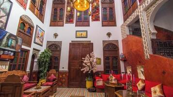 Triple Room, Patio, Courtyard View | In-room safe, free WiFi