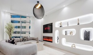 Departamento, vista al mar | Área de sala de estar