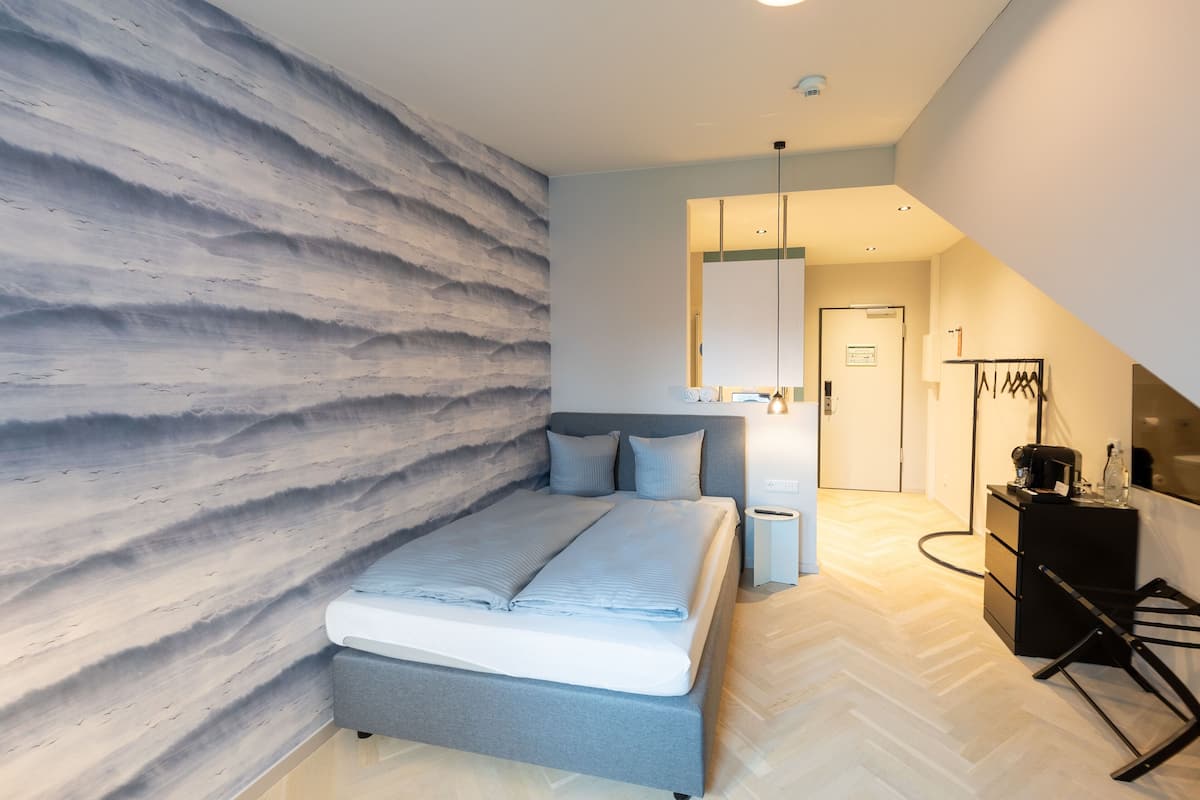 Economy tweepersoonskamer, uitzicht op stad | Een bureau, gratis wifi, beddengoed