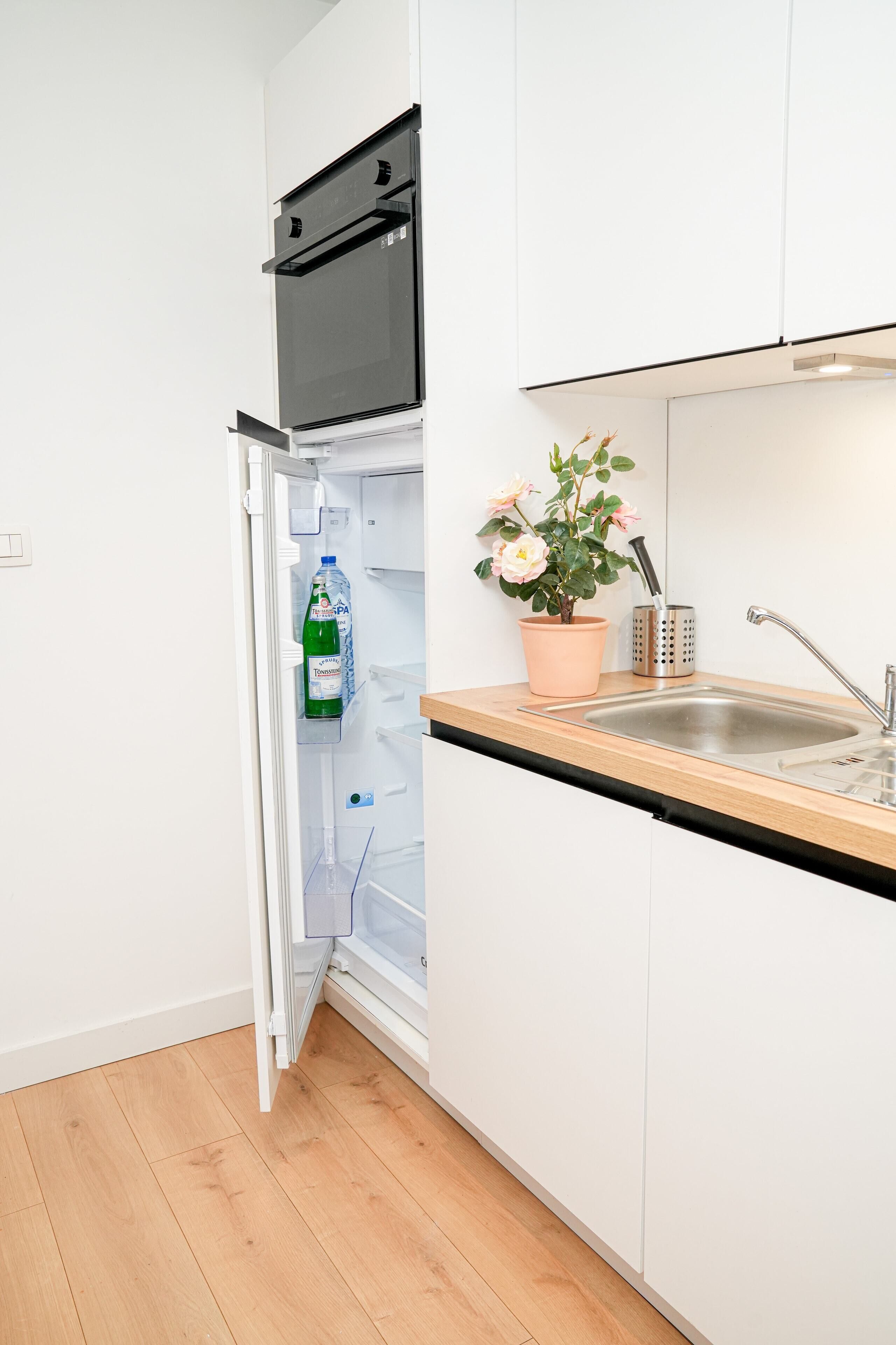 Appartement | Cuisine privée | Mini réfrigérateur, four, plaque de cuisson