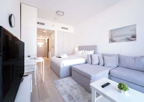 Iron/ironing board, WiFi, bed sheets - Free housekeeping visits during your stay - StayShort - Modern Studio Sleeps 3 in Jumeirah Village Circle (JVC)