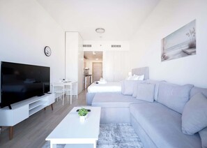 TV - Free housekeeping visits during your stay - StayShort - Modern Studio Sleeps 3 in Jumeirah Village Circle (JVC)