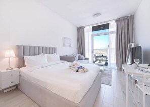 Iron/ironing board, WiFi, bed sheets - Free housekeeping visits during your stay - StayShort - Modern Studio Sleeps 3 in Jumeirah Village Circle (JVC)