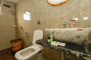 Shower, free toiletries, towels, soap