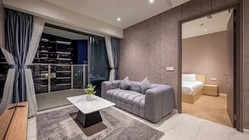 Luxury Apartment, 1 Bedroom, Balcony, City View | Living area | LED TV