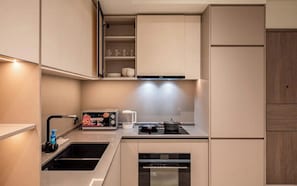 Luxury Apartment, 2 Bedrooms, Balcony, City View | Private kitchen | Full-sized fridge, microwave, oven, stovetop - The Opera Luxury Residence (Ho Chi Minh)