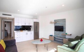 Suite Deluxe, balcó, vistes al mar | Sala d'estar