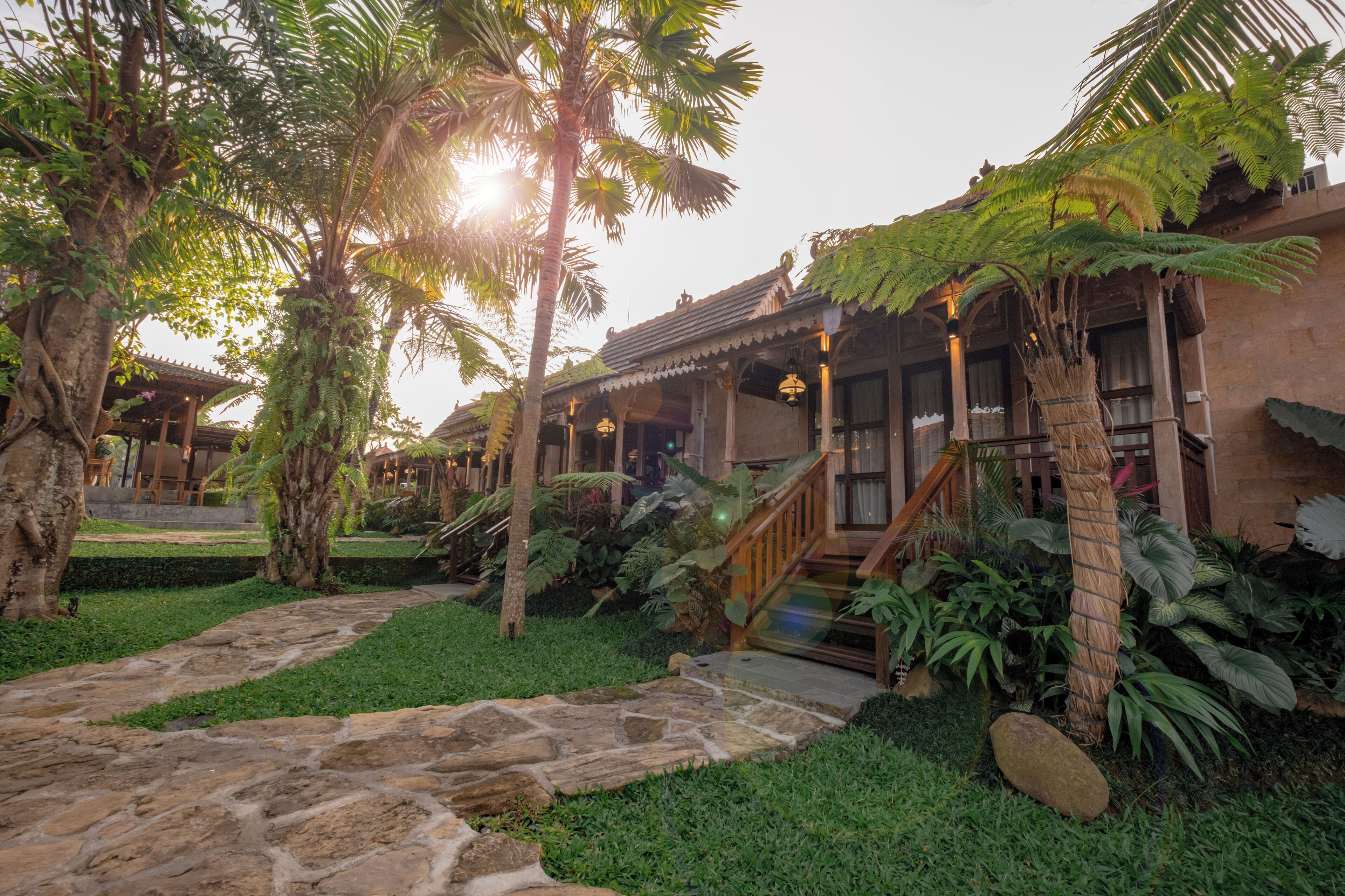 Villa Deluxe, balcón, vista al jardín | Área de sala de estar