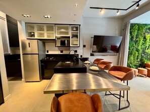 Deluxe Apartment, Beach View | Dining room - The Grey Loft Ipanema (Rio de Janeiro)