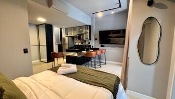 Deluxe appartement, uitzicht op het strand | Lakens van Egyptisch katoen, luxe beddengoed