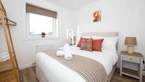 2 quartos, ferros/tábuas de passar roupa, Wi-Fi de cortesia