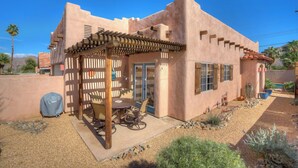 A house with a patio, outdoor furniture, and a pergola. - 3 BR Home, Private Pool, Close to Event Venues (La Quinta)