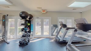 A gym with treadmills, weights, and exercise balls. - Family-friendly Cameron Escape w/ Community Perks (Cameron)