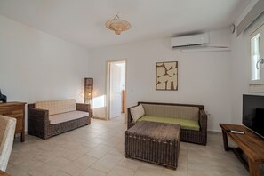 Apartment, 1 Bedroom, Pool View | In-room safe, iron/ironing board, free WiFi - Kriolithos Houses (Paros)