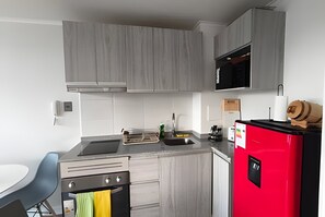 Apartment | Private kitchen - Oceana Suites Edificio HA (Coquimbo)