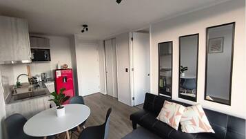 Apartment | Living area | Flat-screen TV