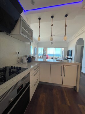 Superior Penthouse, Beach View | Private kitchen - atico azul (Tangier)