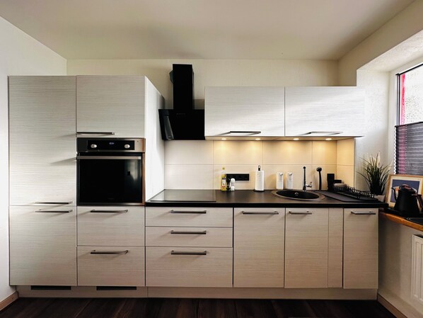 Oven, stovetop, dishwasher, coffee/tea maker