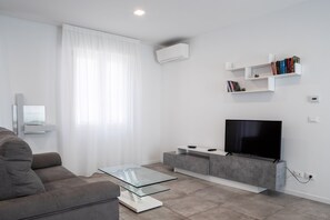 Condo conforto, vista para a cidade | Área de estar