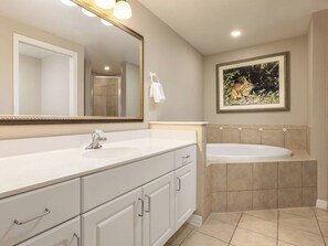 Shower, jetted bath, hair dryer, towels - 2-bedroom hotel suites in tranquil Kissimmee with AC comfort (Kissimmee)