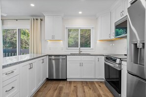 Fridge, microwave, oven, stovetop - Oceanside 3BR Condo, Pool + Deck & Easy Beach Access (Pine Knoll Shores)