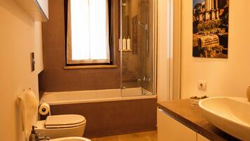 Shower, free toiletries, hair dryer, towels