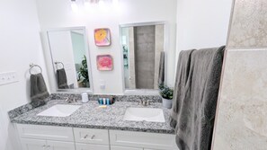 Shower, hair dryer, towels