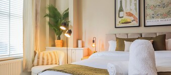 Jimmy Suite | Central 2BR • Sleeps 6 • WI-FI