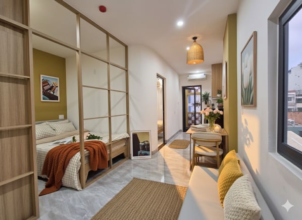Deluxe Apartment, 2 Bedrooms, Balcony | Living area - NomadStay Journey (Son Tra)