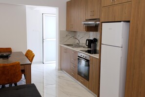 Fridge, oven, electric kettle, toaster