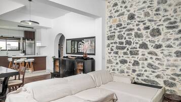 Traditional Villa, 2 Bedrooms, Private Pool, Sea View | Living area | 55-inch Smart TV with satellite channels, fireplace