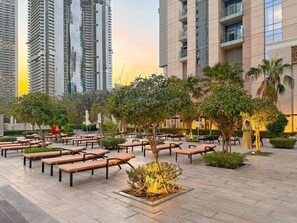 Outdoor dining - FIRST CLASS | 2BR | Luxe Canal View Haven (Business Bay)